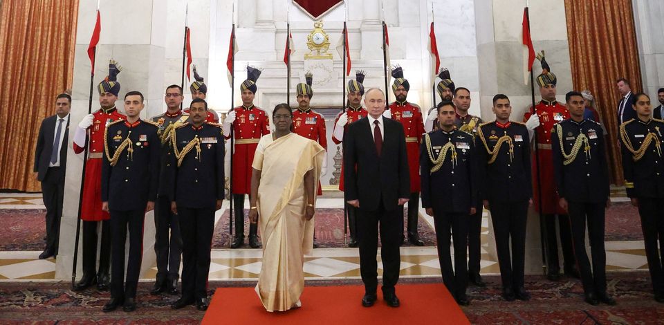 Indian and Russian presidents Droupadi Murmu and Vladimir Putin in New Delhi on Friday. Photo: Reuters